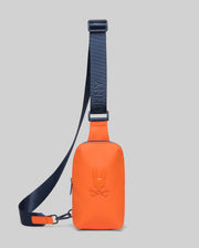 Mens Rubberized Crossbody in vibrant orange with a navy blue strap featuring repeated Psycho Bunny text, and a large embossed bunny skull logo on the front.