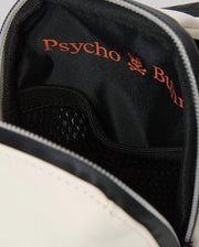 Mens Rubberized Crossbody with an off-white rubberized exterior, black woven interior lining, and large orange Psycho Bunny text and bunny skull logo print, featuring internal mesh pockets and a zipper closure.