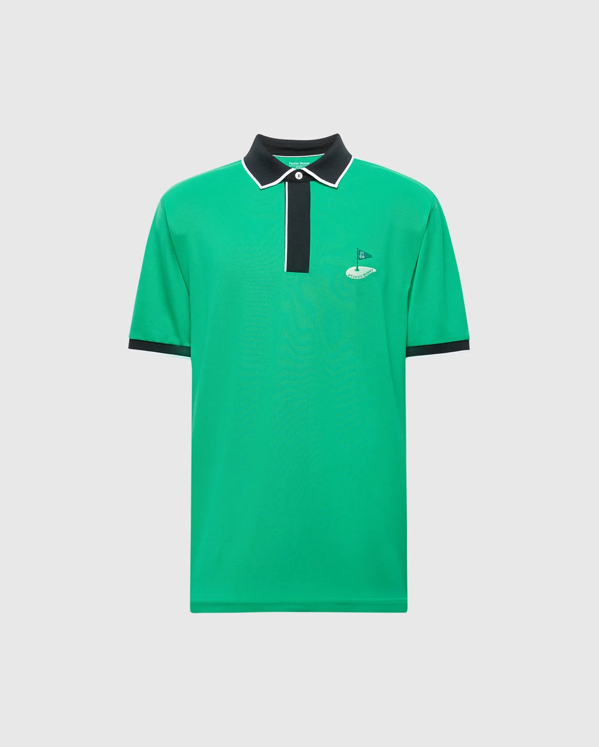 The Psycho Bunny MENS CLAYTON PIQUE POLO (MT0100004) is a green polo shirt made from Pima cotton, featuring colorblocking with a black collar, white-trimmed placket, and short sleeves for breathability. A small flag logo is embroidered on the left chest against a plain white background.