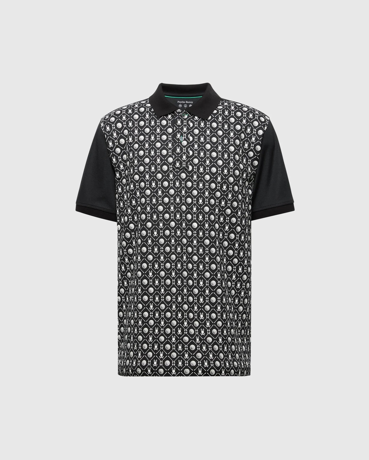 The Psycho Bunny MENS BECKETT PIQUE POLO (MT0100022) is a short-sleeved, breathable polo with a black and white geometric pattern on the front. Made from Pima cotton, it features solid black collar and sleeves and a small green tag inside the collar for added detail.