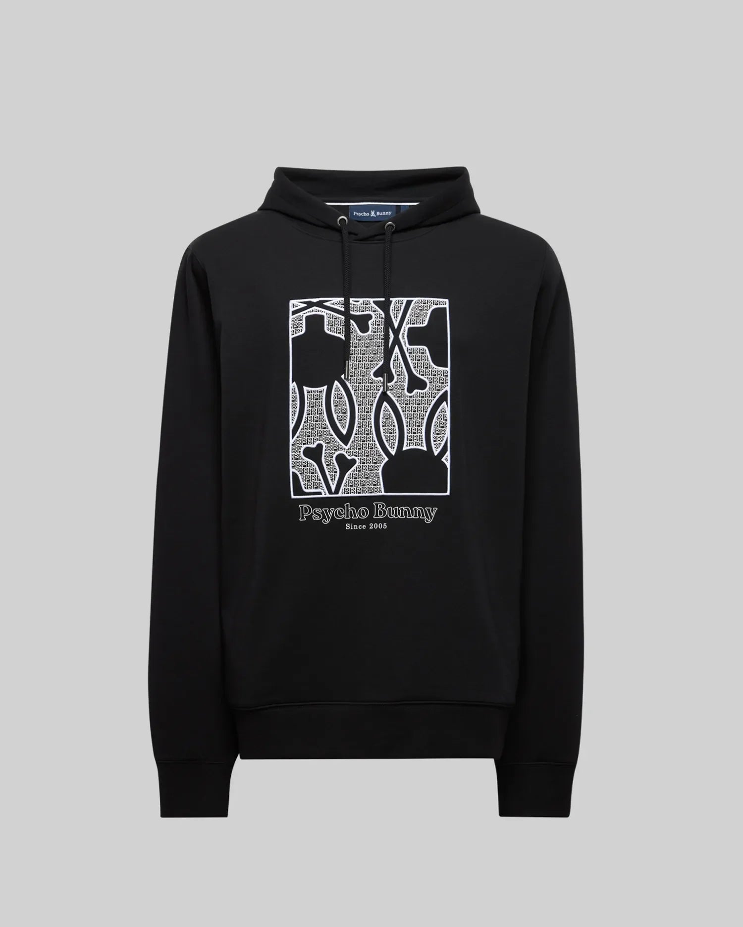 The MENS GLENN HOODIE - MT0500008 by Psycho Bunny is a black cotton-modal hoodie with a white embroidered Bunny and abstract letters on the chest, plus “Psycho Bunny Since 2005” text below. Shown on a plain gray background.