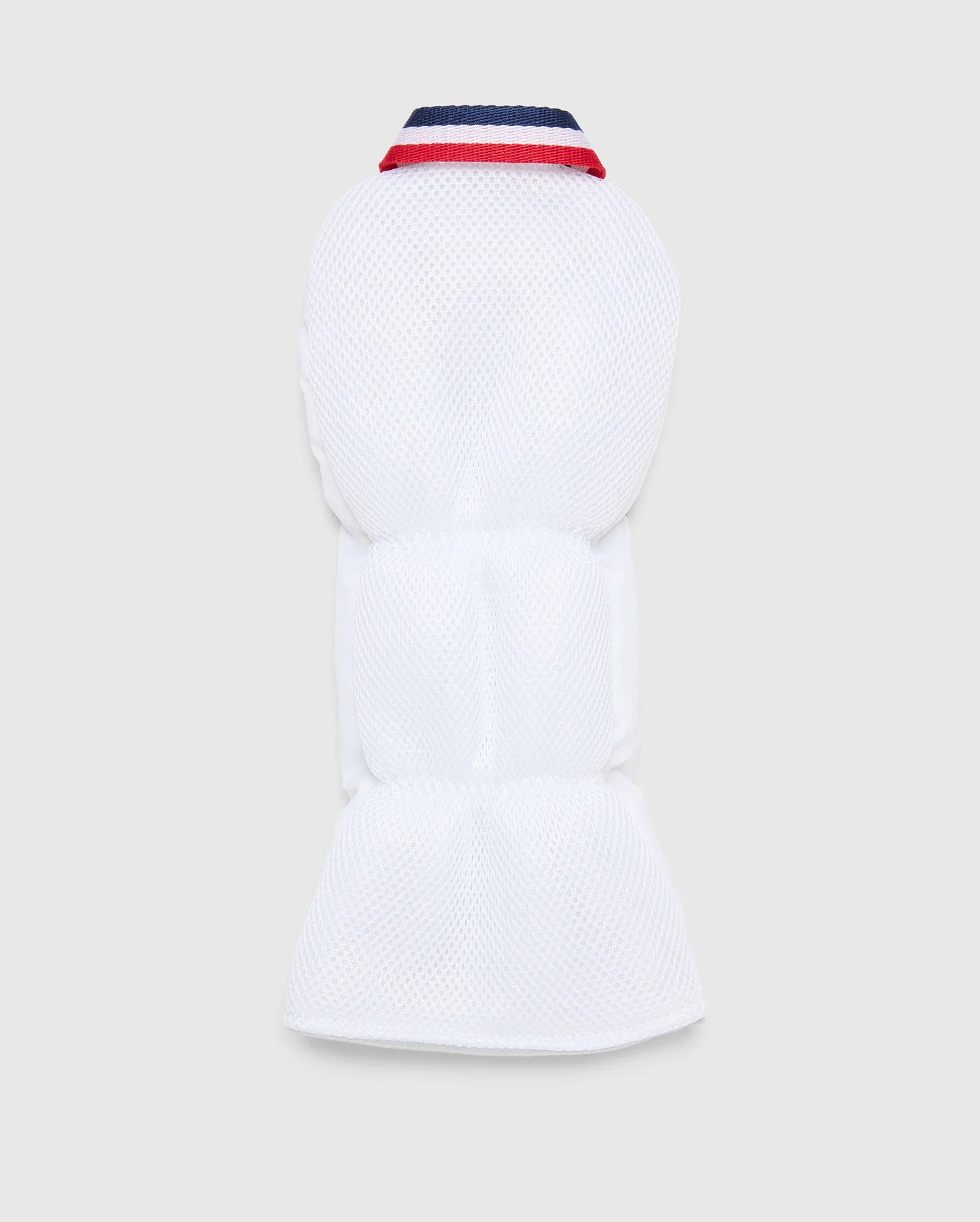The white padded MULTI BUNNY DRIVER HEAD COVER - PBMG4SH1 by Psycho Bunny combines warmth and style with its quilted texture, navy-blue and red collar, and minimalist design. The embroidered logo adds a subtle elegance to the sleek look against a plain background.