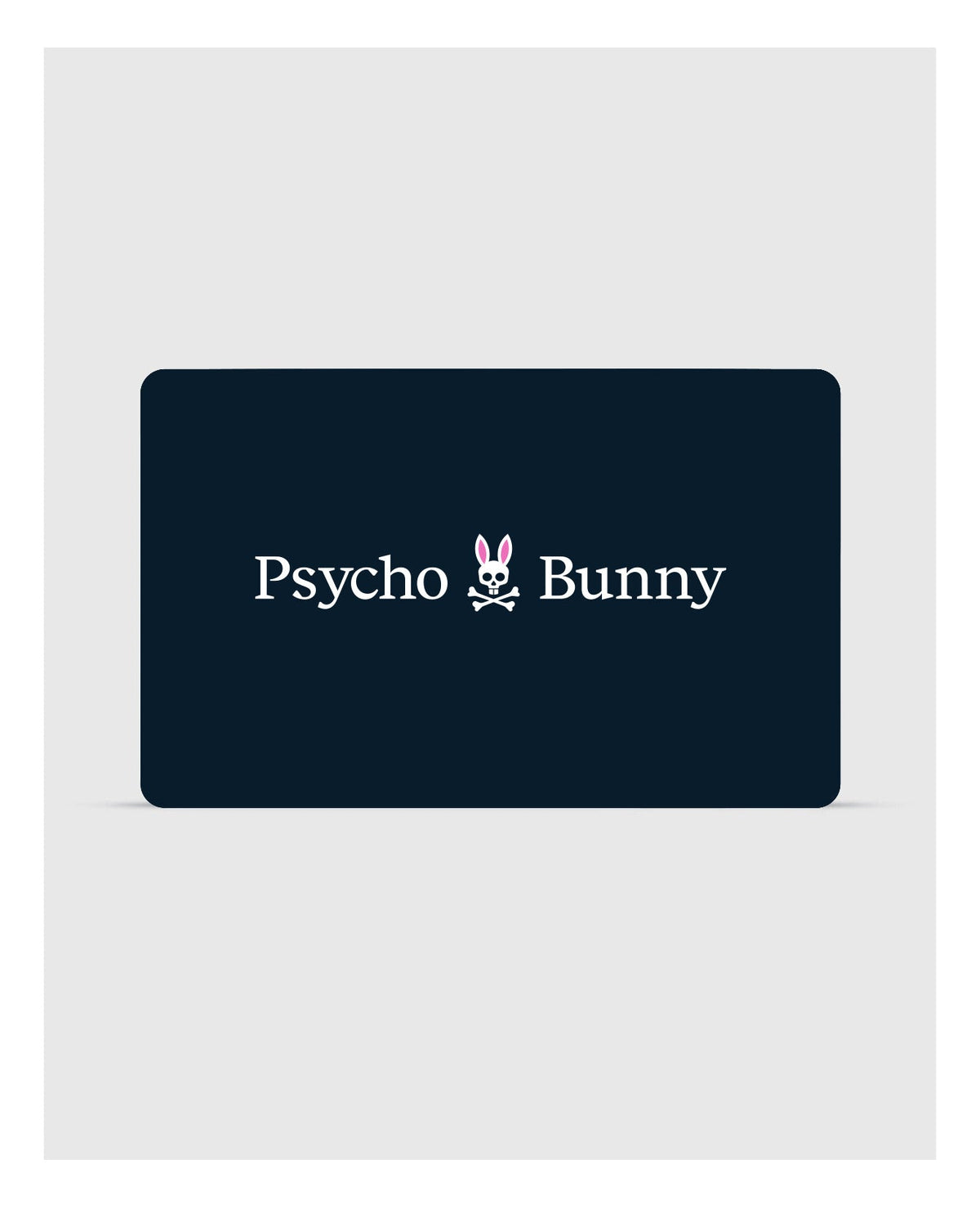 A stylish rectangular black card showcases the "Psycho Bunny" brand in sharp white lettering, accompanied by a logo featuring a bunny head with skull and crossbones beneath it. This Psycho Bunny Digital Gift Card is an ideal choice for fashionable gifts—redeem during checkout to enhance your shopping journey.