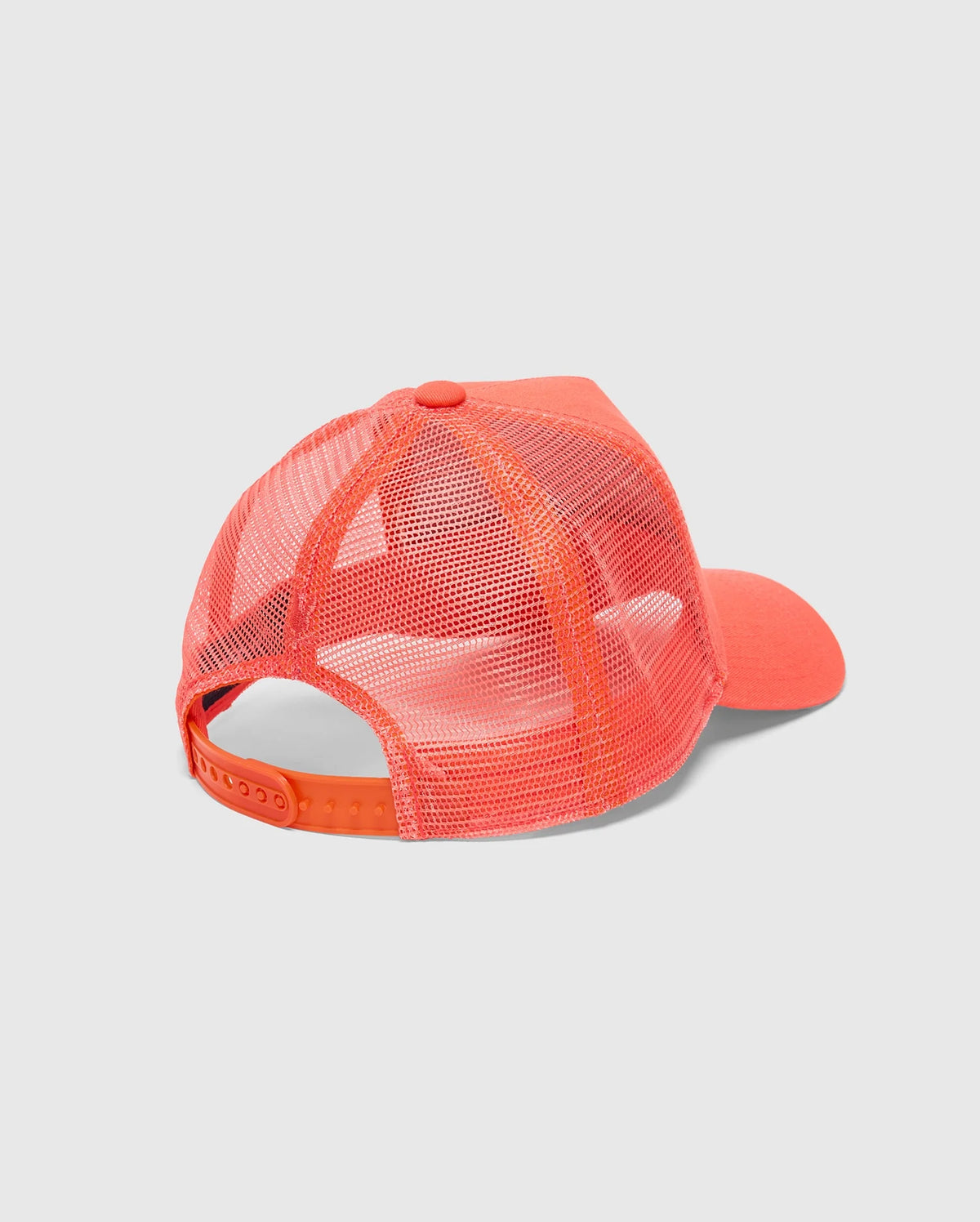 A vibrant orange "KIDS MELBOURNE GRAPHIC TRUCKER HAT - B0A548F200" by Psycho Bunny is seen from behind, featuring a mesh back and adjustable snap-back strap. The front shows a solid orange panel with a curved bill against a plain white background.