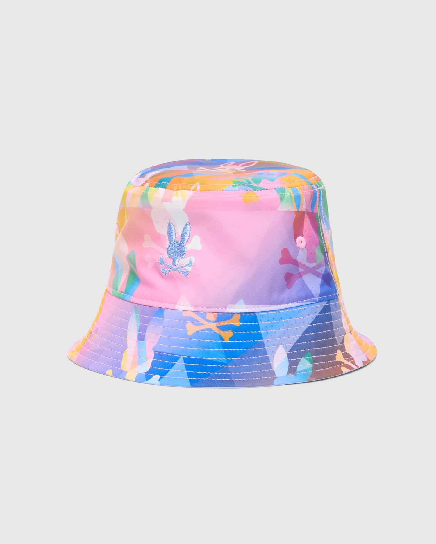 The Psycho Bunny KIDS MILOS BUCKET REVERSIBLE HAT - B0A550F200 features vibrant embroidered abstract patterns and playful illustrations, such as bunnies and skulls, in shades of pink, blue, and orange on a light background.