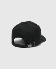 The KIDS CLASSIC BASEBALL CAP - B0A816A1HT by Psycho Bunny features an adjustable fit with a black strap at the back. It includes a metal buckle engraved with the logo and has an embroidered bunny on the front, set against a plain white background.