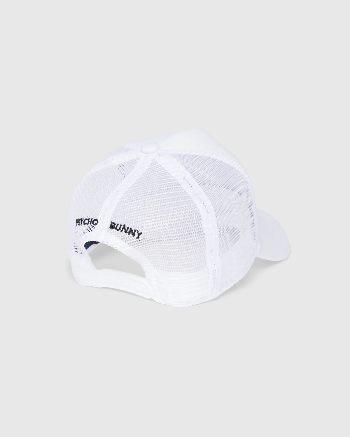 Viewed from the back, the Kids Bunny Patch Trucker Cap by Psycho Bunny features a white mesh with a solid brim. "Psycho Bunny" is embroidered in black on the mesh panel, complemented by a Bunny logo patch and an adjustable snapback closure.
