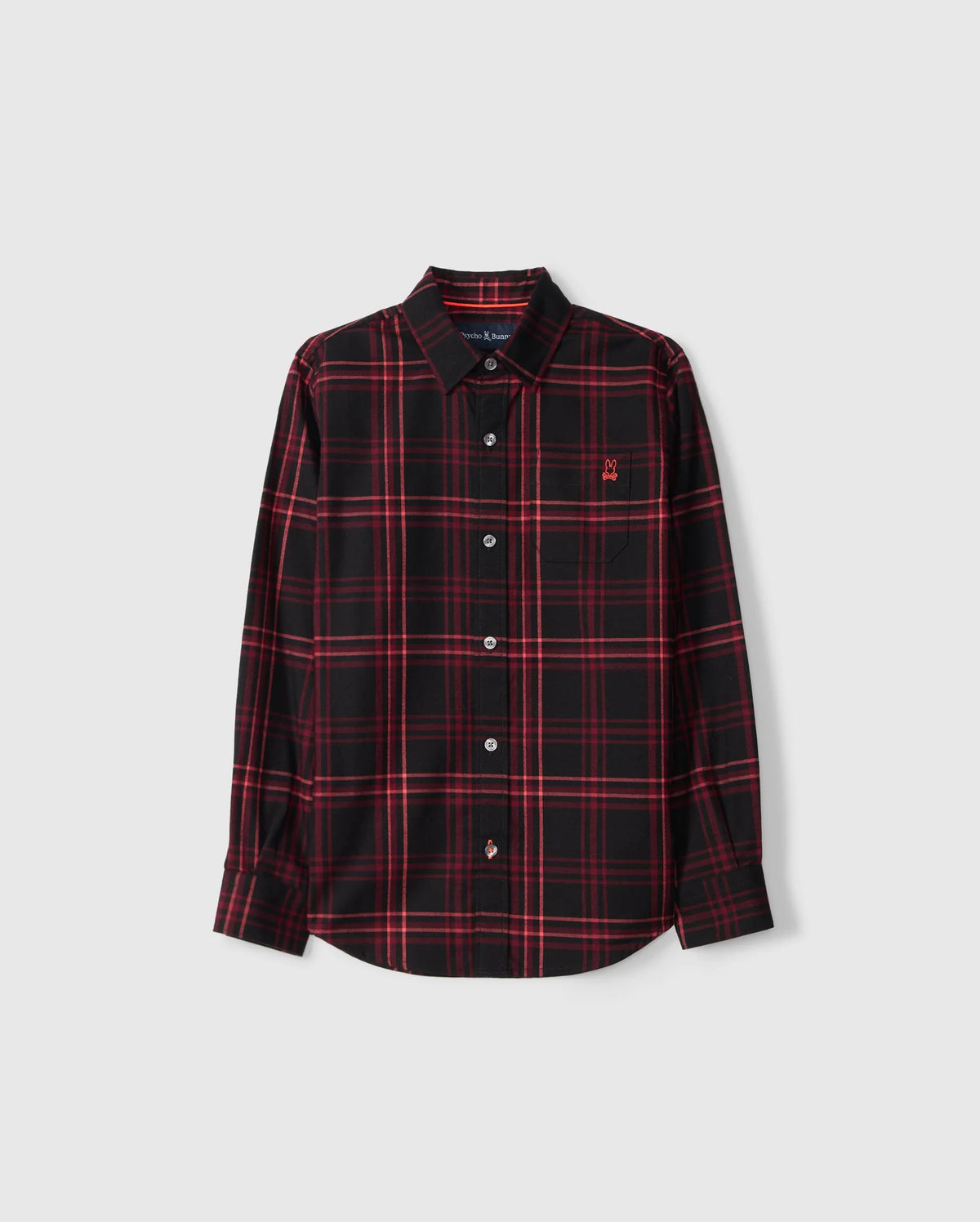 The KIDS HAYES PLAID SHIRT - B0C842D200 by Psycho Bunny is a long-sleeved, black and red plaid shirt made from soft Pima cotton. It includes a collar, buttoned front and cuffs, with a small embroidered emblem on the left chest, shown against a plain white background.