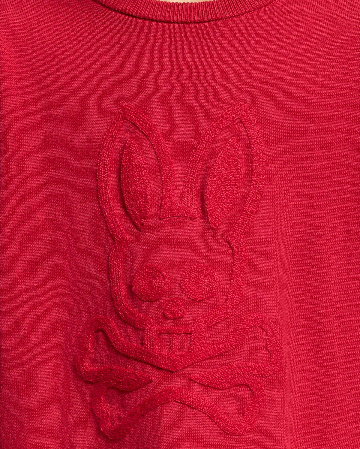 The KIDS COORY CHAINSTITCH COTTON SWEATER from Psycho Bunny is crafted in red extra fine cotton and features a unique embossed bunny skull with crossbones design.
