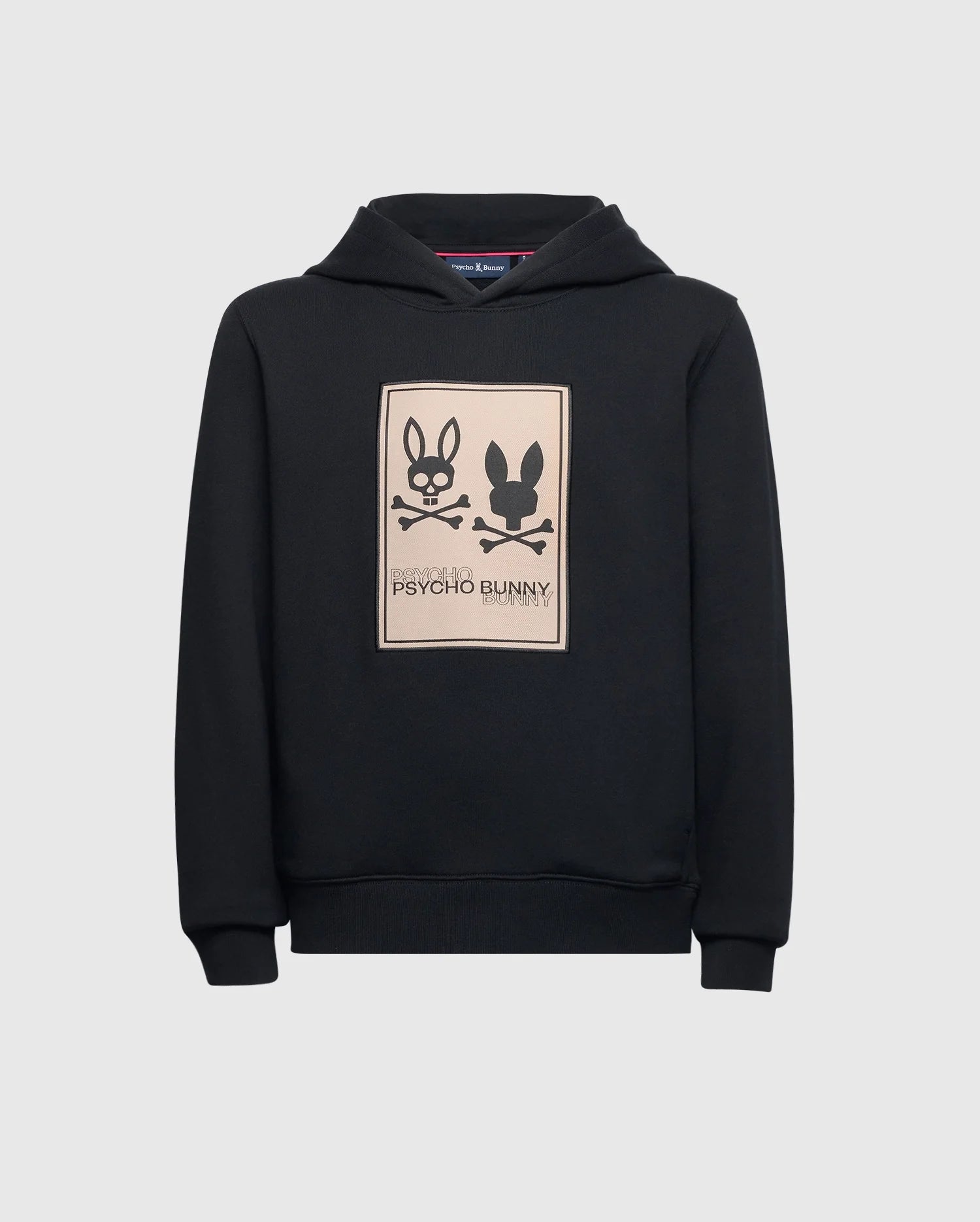 The Kids Monroe Twill Patch Fleece Hoodie, by Psycho Bunny (B0H926D200), features a cozy French terry fabric with a beige rectangular logo appliqué displaying two stylized bunny logos and the "Psycho Bunny" text on the front.