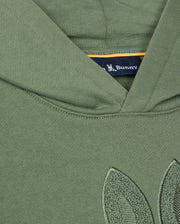Close-up of the KIDS PACIFIC CHENILLE HOODIE in olive green French terry, featuring a subtle chenille leaf embroidery. Inside, a navy tag displays "Psycho Bunny." The fabric looks soft and textured.