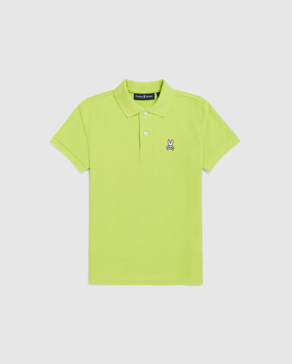 The Psycho Bunny KIDS CLASSIC POLO - B0K001CRPC is a regular fit, lime green piqué polo shirt with a collar and three buttons. Made from soft Pima cotton, it features an embroidered cartoon rabbit on the left chest against a plain white backdrop.