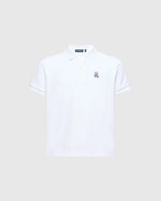 The Psycho Bunny KIDS CLASSIC PIQUE POLO SHIRT - B0K001CRPC is perfect for back-to-school. It features short sleeves, a collar, and an embroidered bunny logo on the left chest against a plain light gray background.