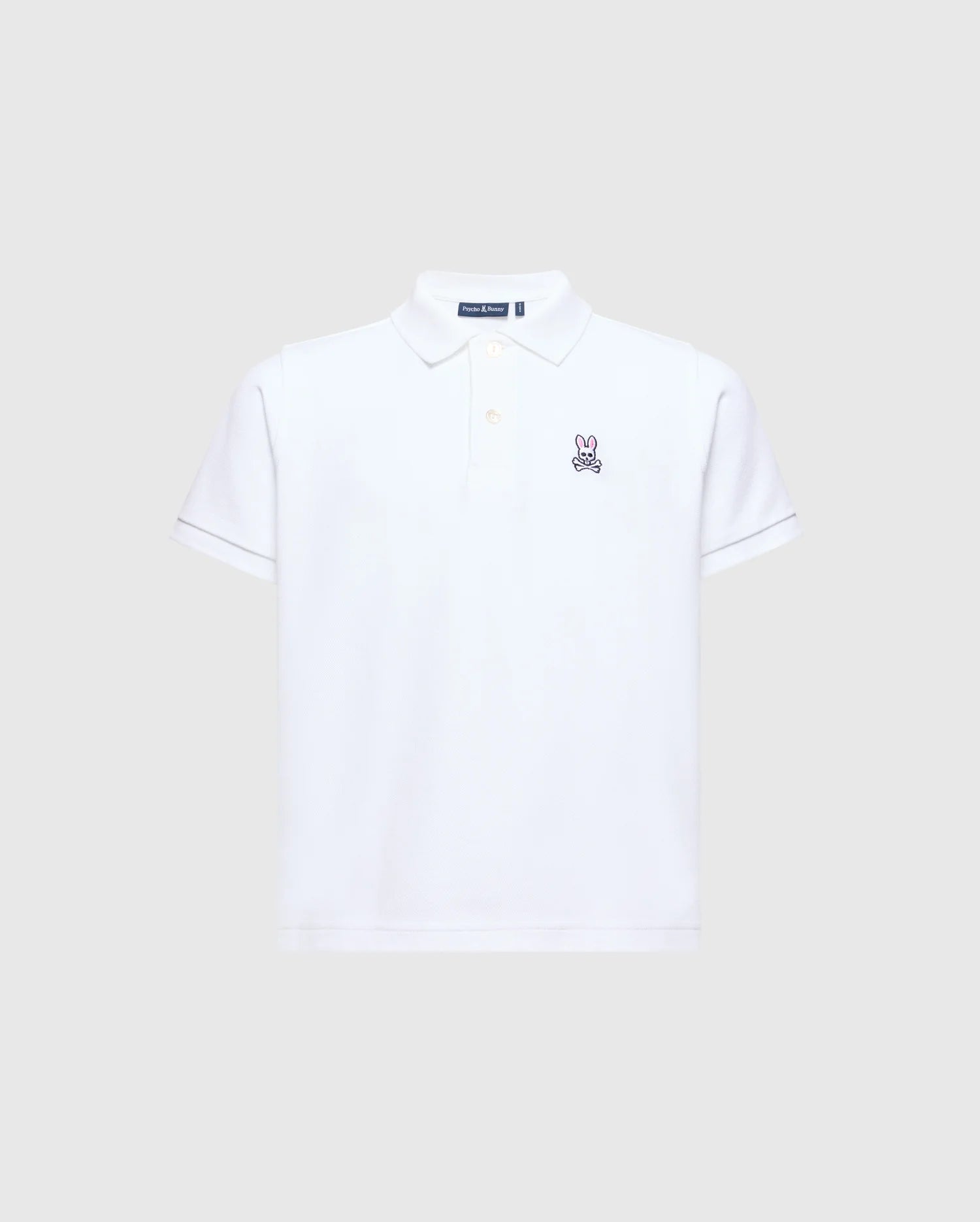 The Psycho Bunny KIDS CLASSIC PIQUE POLO SHIRT - B0K001CRPC is perfect for back-to-school. It features short sleeves, a collar, and an embroidered bunny logo on the left chest against a plain light gray background.