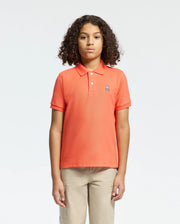 Kids | Kids' hot coral Psycho Bunny classic polo with embroidered logo, ribbed collar, and soft Pima cotton fabric for comfort and style.