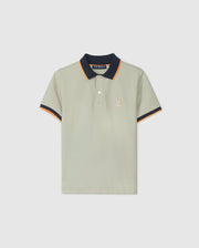 The KIDS KAYDEN PIQUE POLO - B0K675C200 by Psycho Bunny is a light gray Pima cotton pique polo shirt that features a navy blue collar with orange outlines. The shirt is adorned with a small embroidered bunny on the chest and has short sleeves, which are accented by contrasting stripes of navy blue and orange trim on the cuffs.