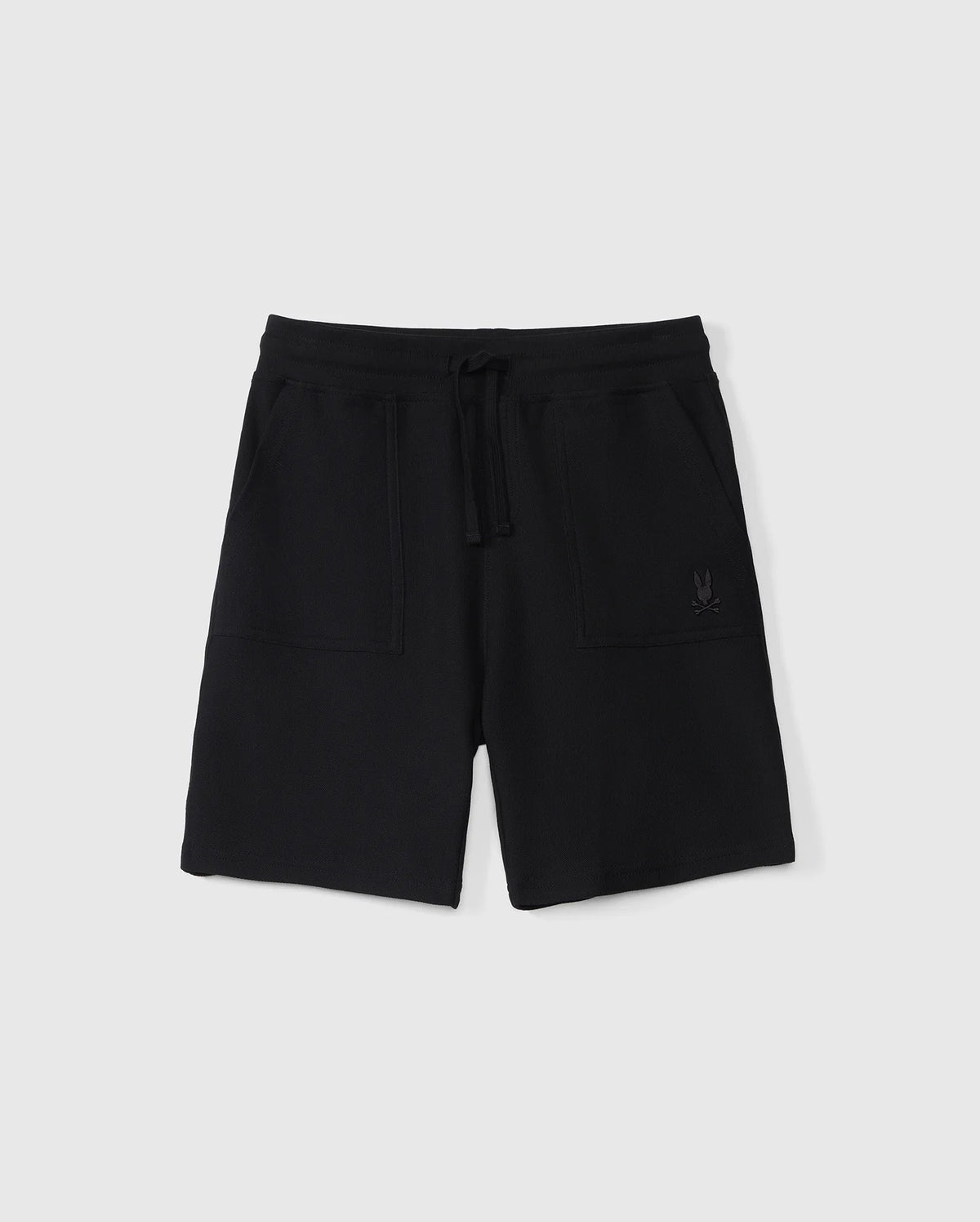 A pair of black athletic shorts with an elastic waistband and drawstring. Crafted from Pima cotton piqué, these KIDS STANFORD LIGHT PIQUE SWEATSHORT - B0R344B200 by Psycho Bunny feature two front pockets and a small embroidered emblem on the right pocket. A stylish wardrobe staple against a plain white background.