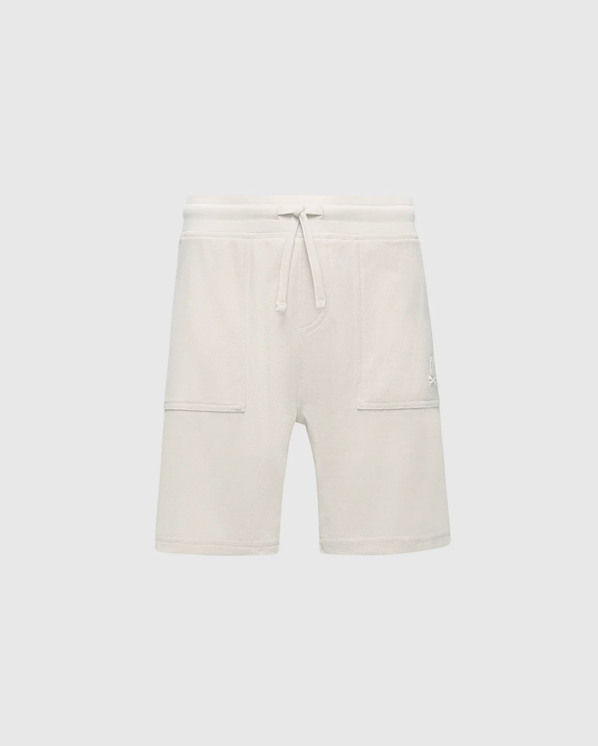 The KIDS TAYLOR LIGHT PIQUE SWEATSHORT by Psycho Bunny features white fleece with an adjustable drawstring, two large front pockets, and soft Pima cotton for comfort. A playful embroidered Bunny stands out against the light gray background, perfect for casual-chic style.