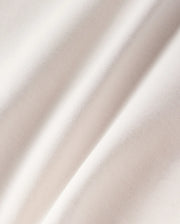 Close-up of soft, gently rippled white satin fabric highlighting its smooth texture and subtle sheen under soft micro French terry lighting Psycho Bunny KIDS LIVINGSTON TERRY SWEATSHORT - B0R408B200.
