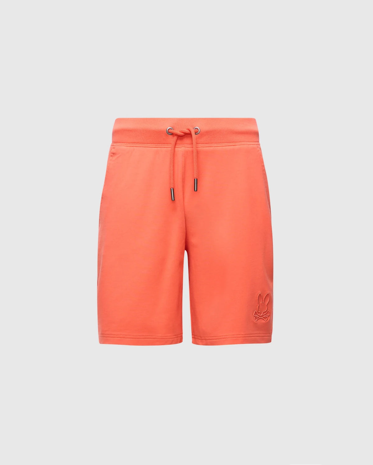 Psycho Bunny's KIDS LEVANZO FRENCH TERRY SWEATSHORT, model B0R578F200, features an orange hue with a drawstring waist and an embroidered logo on the left leg. Crafted from micro French terry, they offer a simple, casual design against a plain gray background.