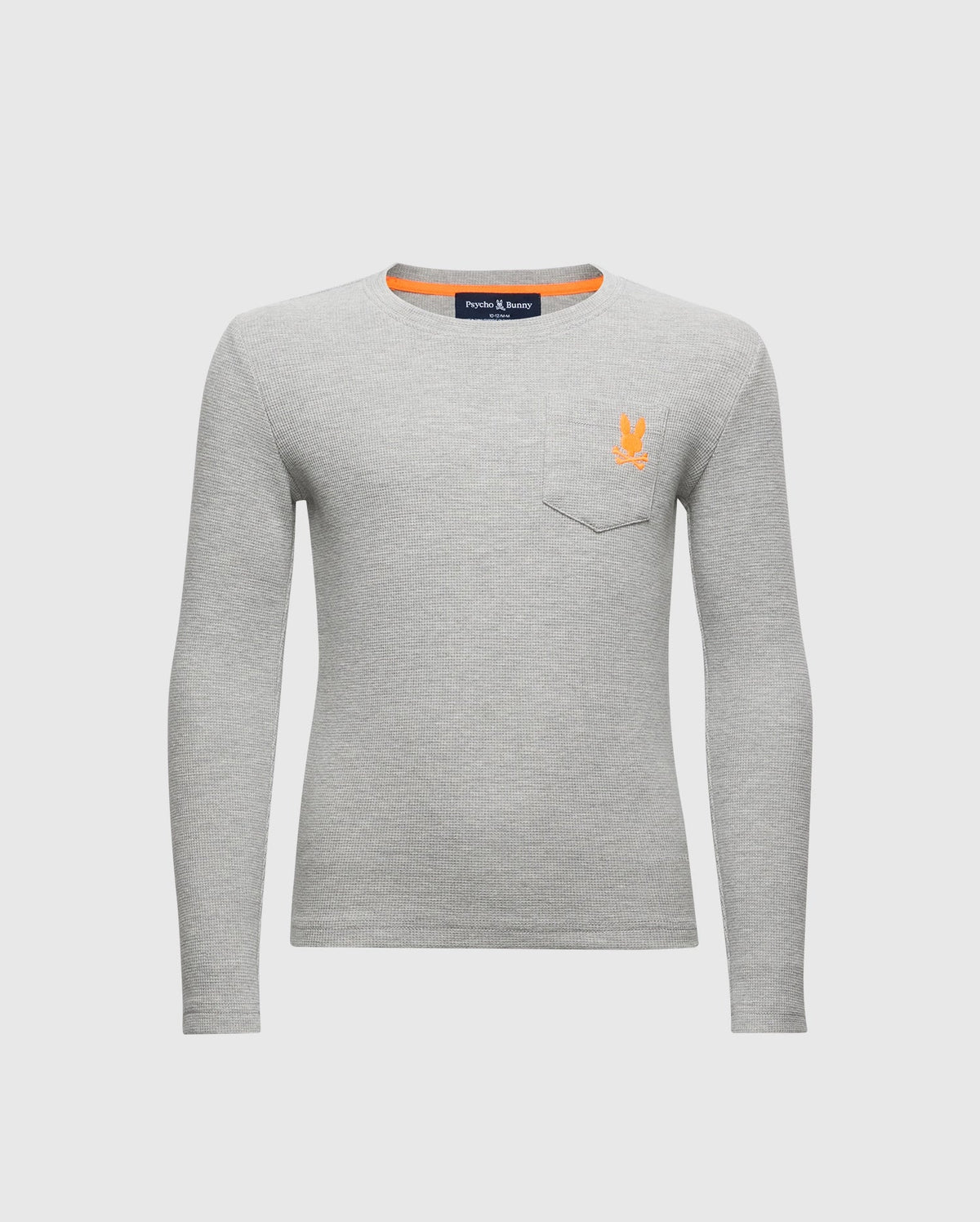 The Psycho Bunny KIDS VAL WAFFLE LONG SLEEVE TEE - B0T672E200 in light gray features a left chest pocket and an orange embroidered logo. Its simple design, crafted from soft Pima cotton, is highlighted against a plain white background.