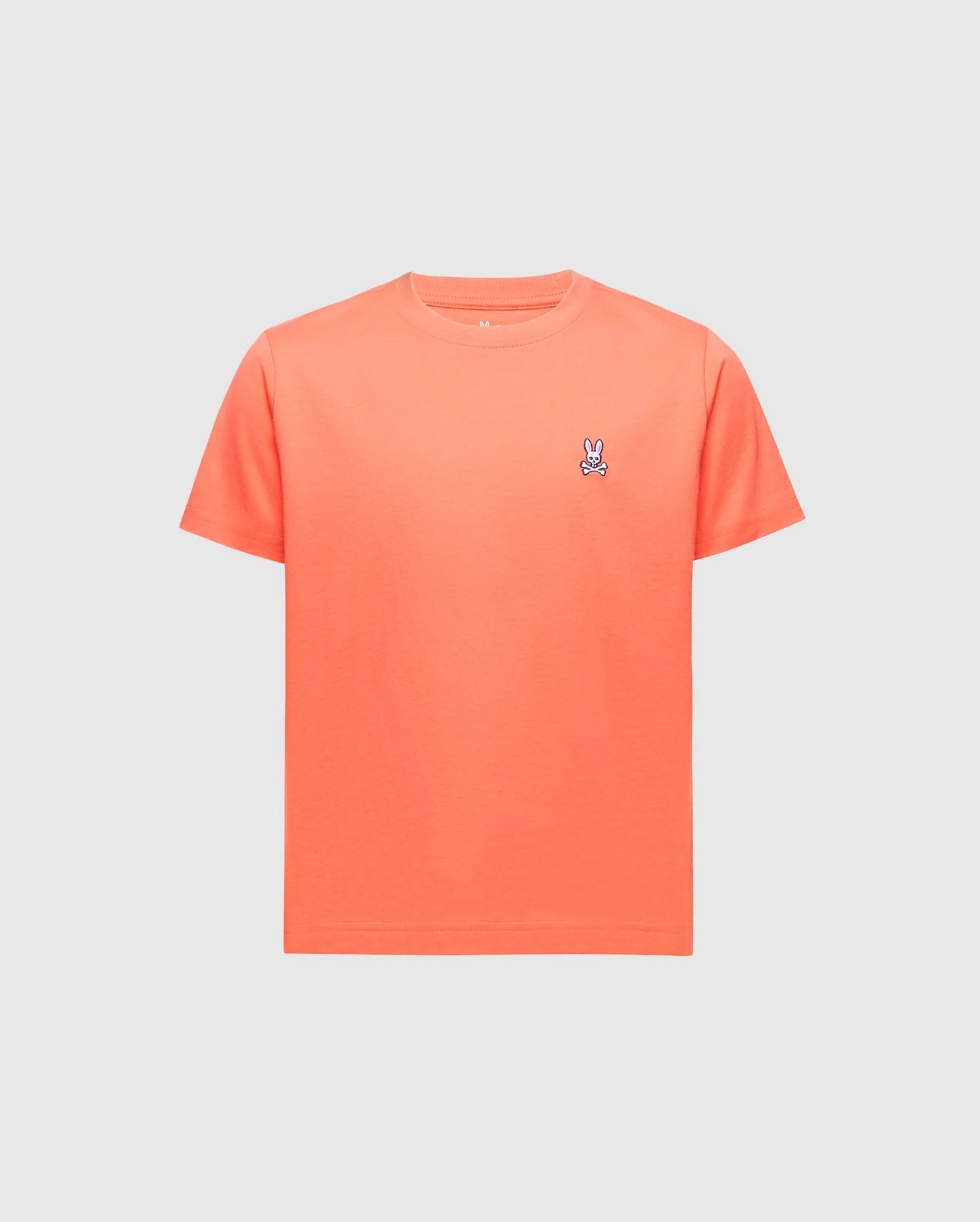 The KIDS CLASSIC CREW NECK TEE - B0U014F200 by Psycho Bunny is a soft Pima cotton T-shirt. It features a small embroidered cartoon bunny logo on the left chest in plain orange, perfectly contrasting its light gray background.