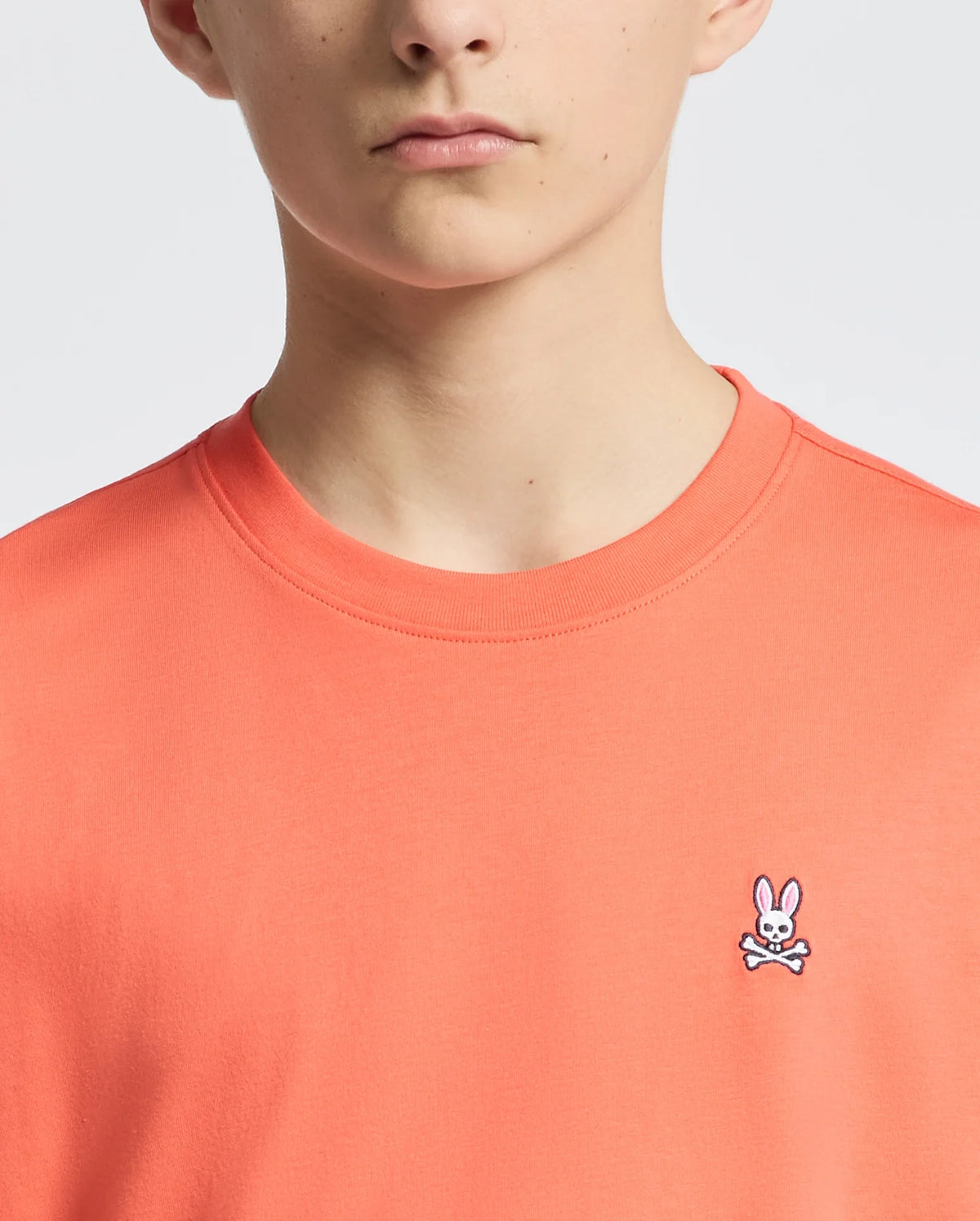Teen | Kids' Classic Crew Neck Tee in hot coral by Psycho Bunny, featuring a soft cotton design and embroidered logo for a bold, stylish look.