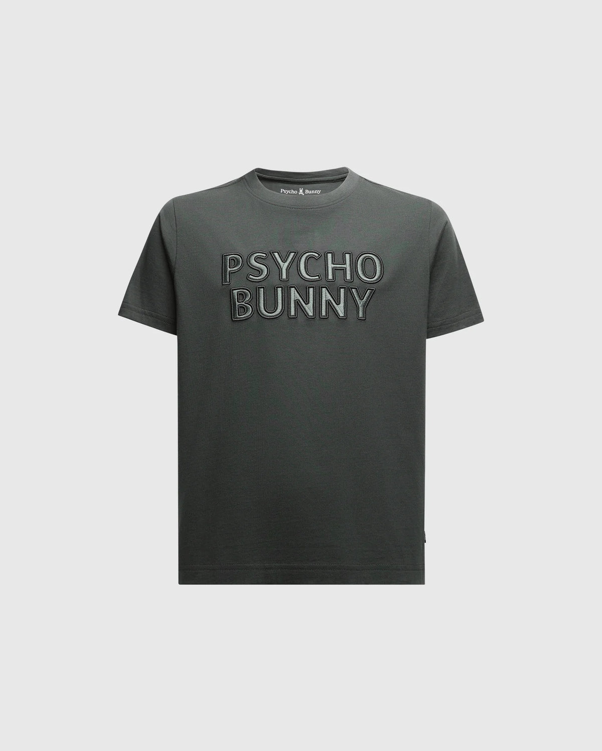 A navy kids' T-shirt from Psycho Bunny, the KIDS PIERCE EMBROIDERED GRAPHIC TEE - B0U116E200, showcases "Psycho Bunny" in prominent lettering across the front. Made from soft Pima cotton, it boasts a classic crew neck design and short sleeves against a clean white backdrop.