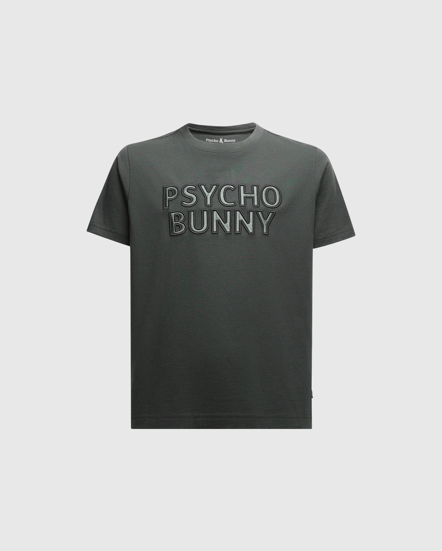 A navy kids' T-shirt from Psycho Bunny, the KIDS PIERCE EMBROIDERED GRAPHIC TEE - B0U116E200, showcases "Psycho Bunny" in prominent lettering across the front. Made from soft Pima cotton, it boasts a classic crew neck design and short sleeves against a clean white backdrop.
