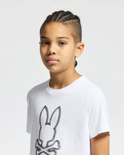 The image shows a white short-sleeved t-shirt with a black Psycho Bunny logo on the left chest.