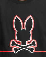 The KIDS DACANO FRONT GRAPHIC TEE - B0U314E200 by Psycho Bunny is a regular fit black shirt featuring a red outlined stylized rabbit head above crossed bones, offering comfort for any casual outing.