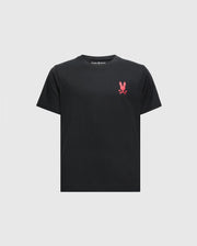 This fashionable KIDS RIO BACK GRAPHIC TEE - B0U363E200 in black features a small pink skull and crossbones on the upper left, made from soft Peruvian Pima cotton. The shirt proudly displays the Psycho Bunny brand inside the collar against a plain white background.