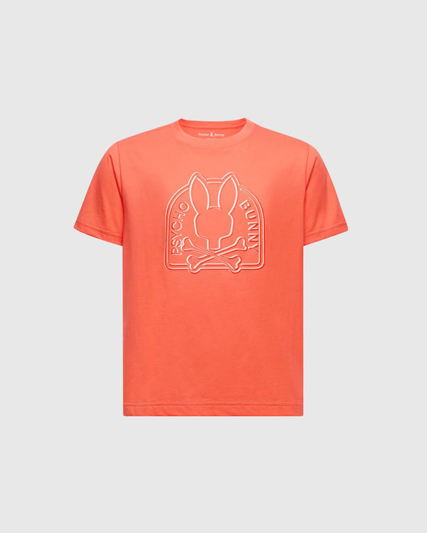 The KIDS MELBOURNE GRAPHIC TEE offers a bold orange color with a unique bunny and crossbones design, branded "Psycho Bunny" text, crafted from soft Peruvian Pima cotton for comfort. It features a classic crew neck and short sleeves.
