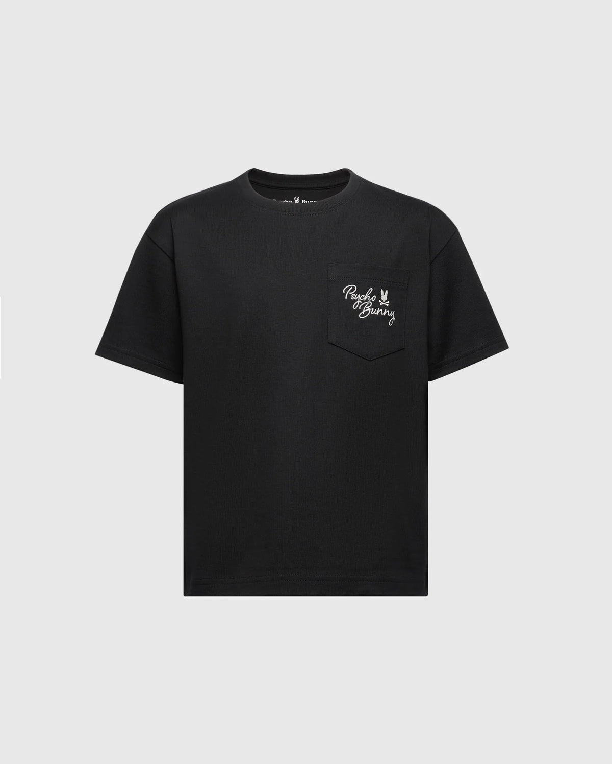 This black heavyweight jersey KIDS DESERT OVERSIZED POCKET TEE by Psycho Bunny features short sleeves and a left chest pocket with "Peace Bunny" in white embroidery, alongside a peace sign and bunny graphic. The light gray backdrop offers a subtle contrast. Product Code: B0U512F200.