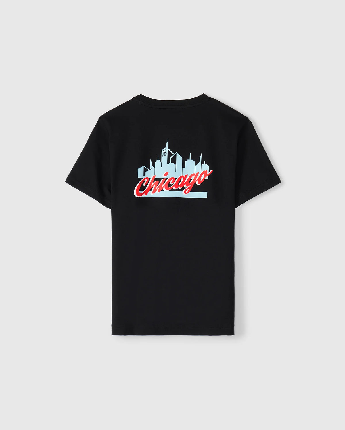 The Kids Chicago City Tee by Psycho Bunny, available in black, is made from soft Pima cotton jersey and showcases a light blue skyline silhouette with "Chicago" prominently written in red cursive below. This eye-catching design is centered on the back of the T-shirt.