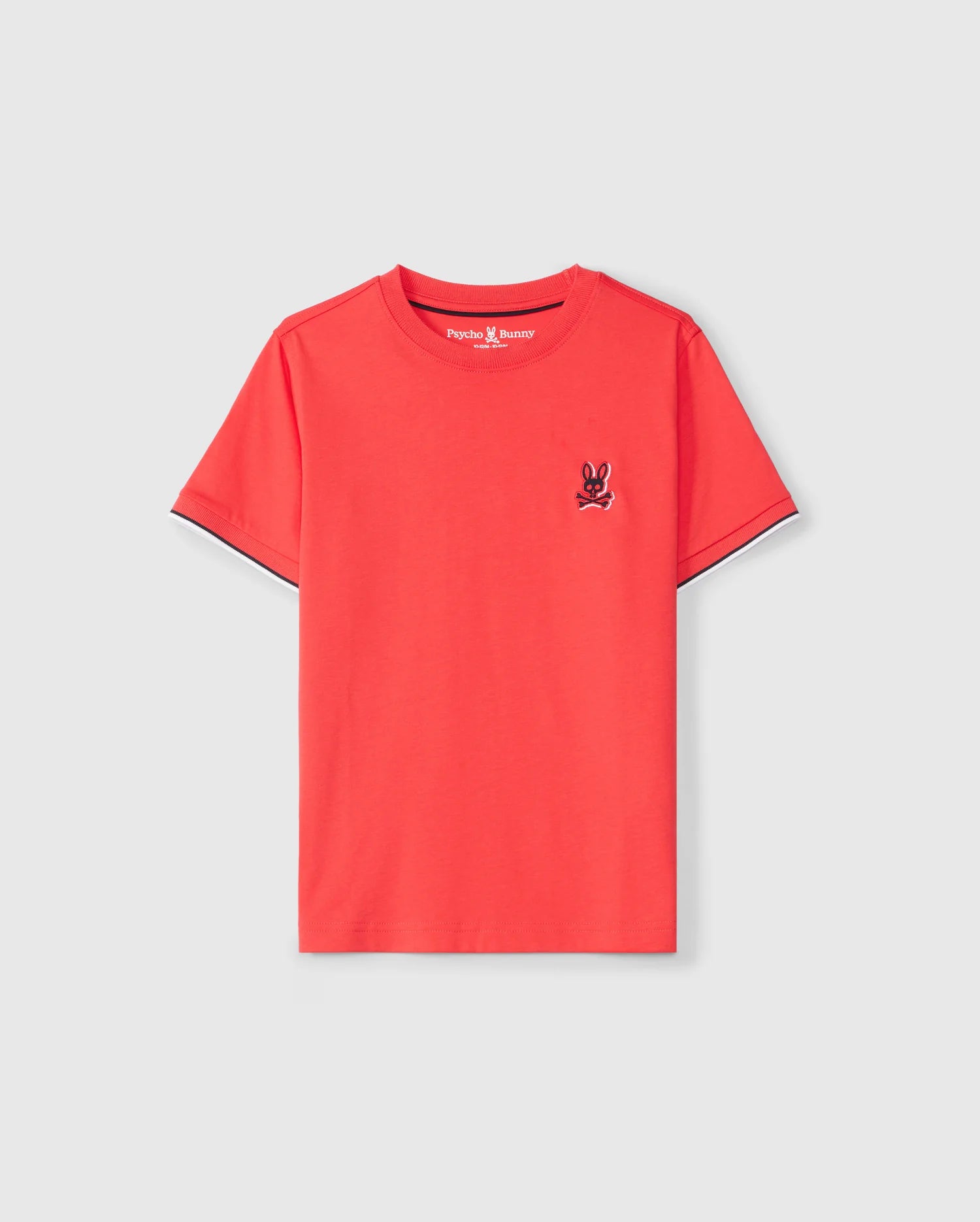 A red kids' KIDS KAYDEN FASHION TEE - B0U577C200 from Psycho Bunny featuring a small, embroidered chest Bunny graphic on the left. The neckline is a classic crew neck, and the shirt has a simple, clean design made from soft Pima cotton. The background is plain white.