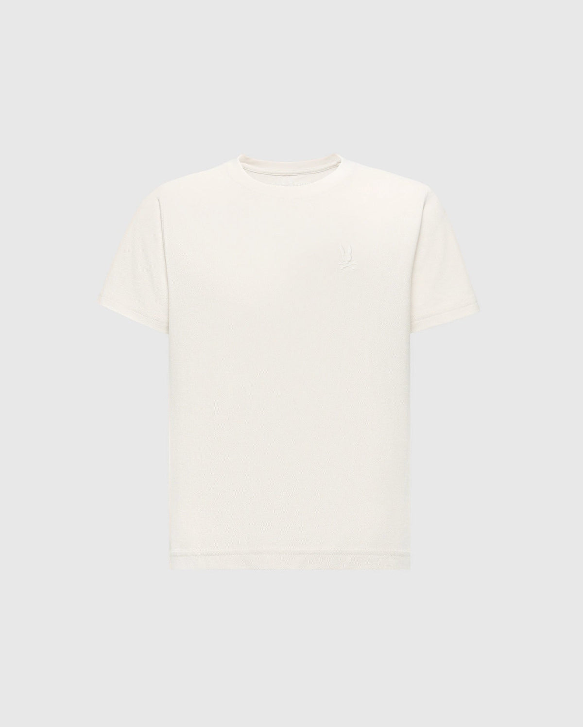 The KIDS TAYLOR PIQUE TEE (B0U579F200) by Psycho Bunny is a regular-fit, white, short-sleeve tee made of lightweight Pima cotton with an embroidered Bunny logo on the upper left side and set against a light gray background.