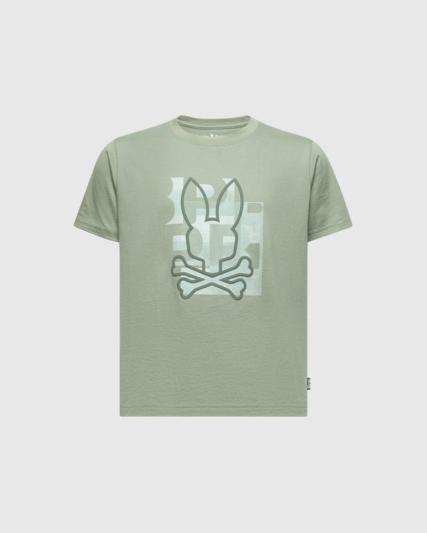 The KIDS ZEALAND GRAPHIC TEE - B0U604F200 by Psycho Bunny is a light green Pima cotton T-shirt with a big bunny logo with crossed bones on the front. It features subtle geometric shapes in lighter shades on a plain light gray background.