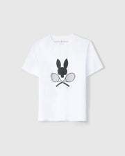A white KIDS COURTSIDE GRAPHIC TEE - B0U681C200 featuring a black silhouette of a bunny's head above two crossed tennis rackets on the front. The brand name "Psycho Bunny" is printed on the inside neckline. This tennis-inspired t-shirt is displayed against a plain light grey background.