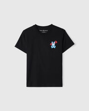 The KIDS LOS ANGELES CITY TEE - B0U861A2PC by Psycho Bunny is a black, short-sleeved, round-neck T-shirt made from Peruvian Pima cotton. It features a small, colorful graphic design of a rabbit wearing sunglasses and holding palm leaves on the left chest area, with vibrant red and blue colors that stand out brilliantly.