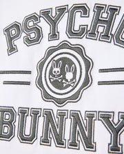 The Psycho Bunny Official logo, featuring two bunny silhouettes inside a circle and encircled by the text "Psycho Bunny," is printed on luxurious pima cotton, similar to the high-quality designs on the Kids London Raglan Graphic Tee - B0U896D200.