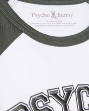 Close-up of a Kids London Raglan Graphic Tee (B0U896D200) by Psycho Bunny, featuring green neckline and sleeves, "PSYCHO" in bold black, and crafted from 100% Pima cotton in Peru for style and comfort.