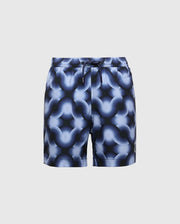 The KIDS PAROS PRINTED SWIM TRUNK - B0W450F200 by Psycho Bunny features a bold, geo-patterned design with interconnected blue and white circles. They include a comfortable drawstring waist set against a plain gray background.