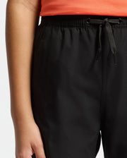 Kids | Black swim shorts with hydrochromic technology