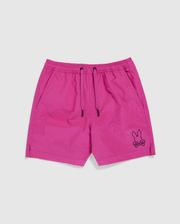 Bright pink quick-drying KIDS PARKER HYDROCHROMIC SWIM TRUNKS from Psycho Bunny, featuring a black drawstring waistband and pockets on each side. These stylish trunks are adorned with the distinctive bunny and crossbones logo on the bottom left side, making them perfect for those sunny beach days.