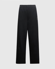 The WOMENS ALEXANDER SWEATPANT - B2P157E200 by Psycho Bunny showcases stylish knit joggers with a relaxed fit and an elastic waistband. These women's black sweatpants feature a subtle logo on the upper left thigh and are crafted from a comfortable cotton blend, all set against a simple, light gray background.