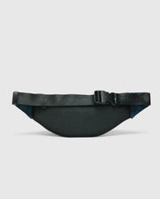A black nylon MENS CROSS BODY BAG - B6A181E200 by Psycho Bunny features a textured surface with an adjustable strap and buckle. The functional waist bag is displayed against a light gray background.