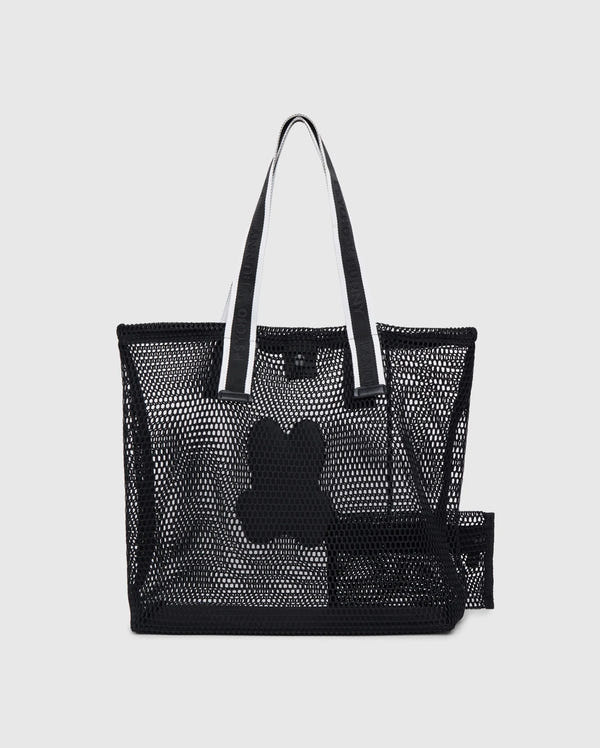 A black mesh tote bag with white handles featuring a medium-size black dog bone design in the center. Inside the tote, there's a detachable zip pouch made of black mesh. The logo-webbing straps add an extra touch of style against the plain white background. This is the MENS MESH TOTE BAG - B6A388B200 by Psycho Bunny.