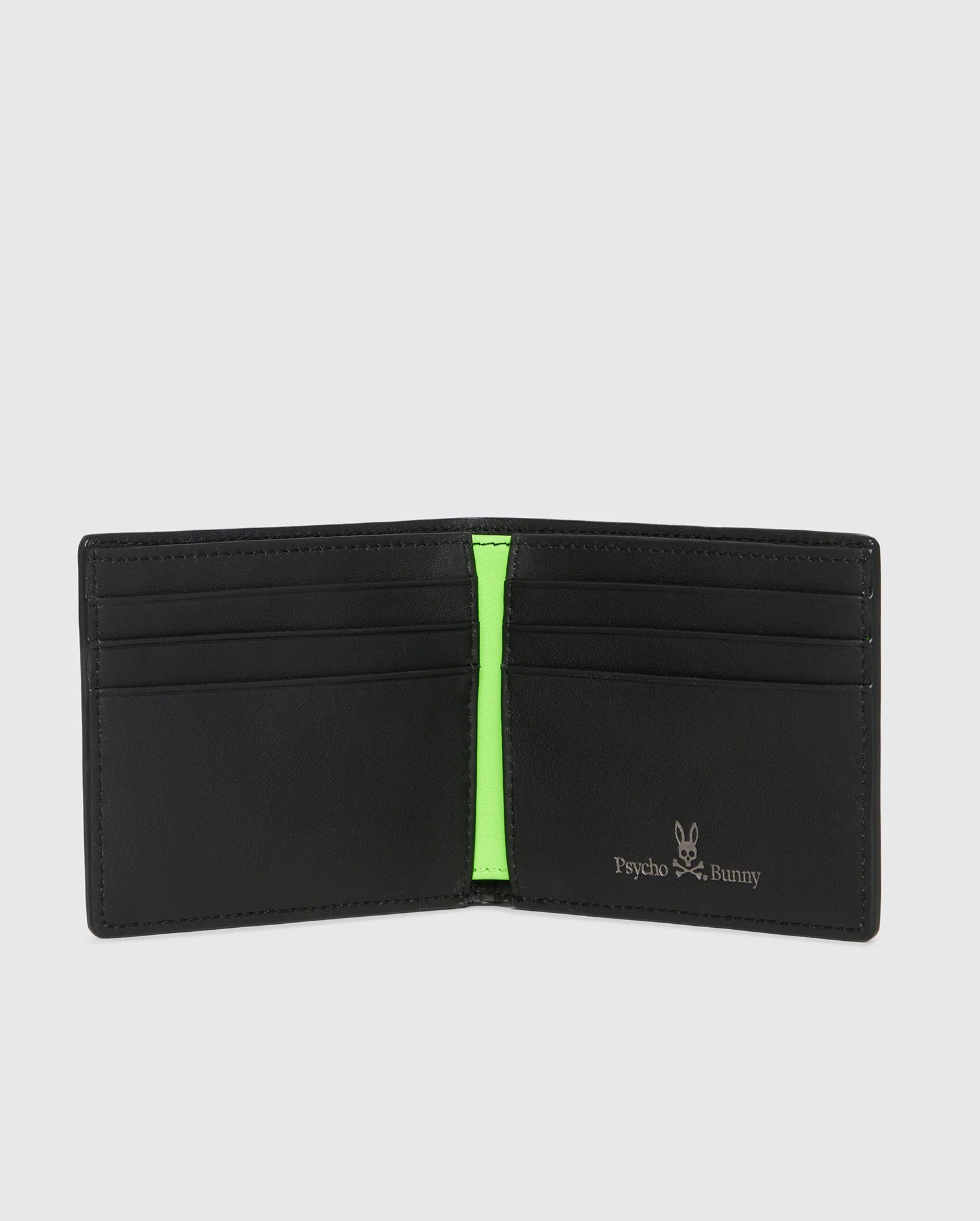 A black grained leather Psycho Bunny wallet with multiple card slots, featuring a vibrant green stripe in the center and a small logo of a 'psycho bunny' on the bottom right corner.