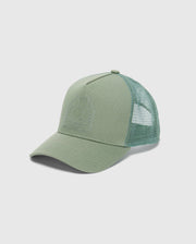 Introducing the Psycho Bunny MENS MELBOURNE GRAPHIC TRUCKER HAT - B6A548F200: a stylish green cap with an embroidered bunny above crossed bones on the front panel. Its mesh back ensures breathability, and the curved brim with adjustable strap makes it ideal for any outing.